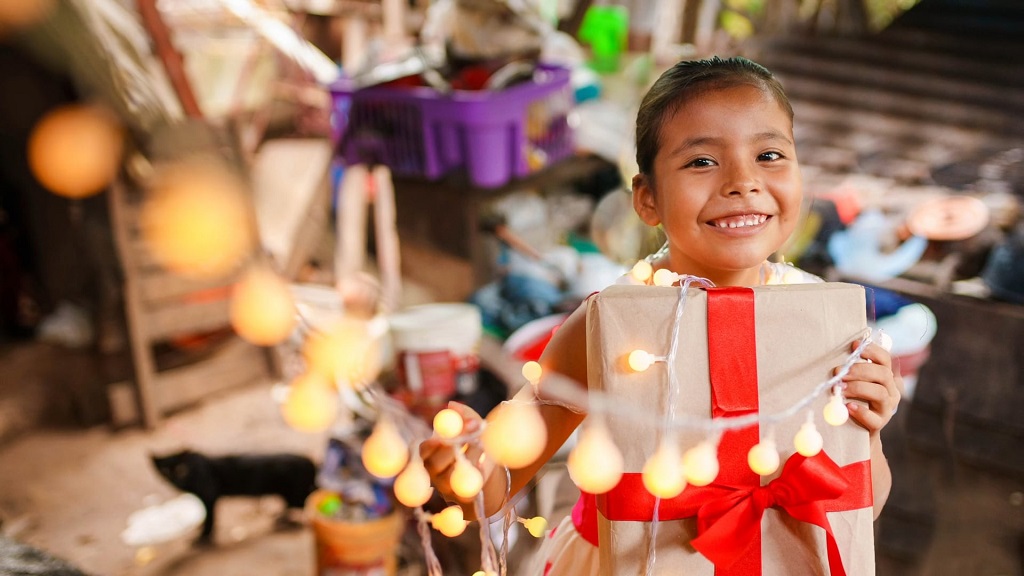 Kids Enjoy Christmas Charity and Giving Back